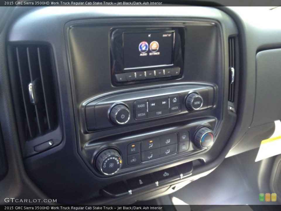 Jet Black/Dark Ash Interior Controls for the 2015 GMC Sierra 3500HD Work Truck Regular Cab Stake Truck #96585707