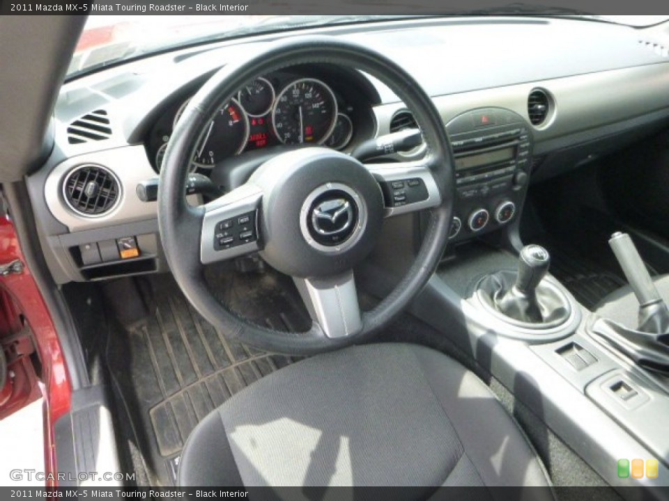 Black Interior Prime Interior for the 2011 Mazda MX-5 Miata Touring Roadster #96676112