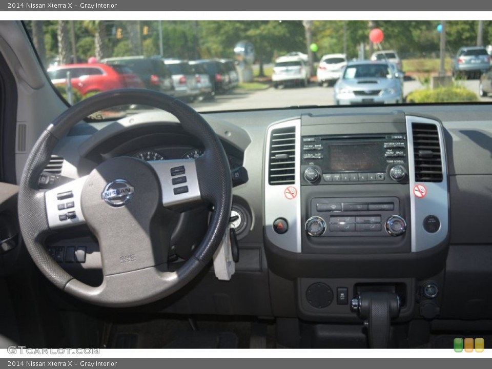 Gray Interior Dashboard for the 2014 Nissan Xterra X #96696082