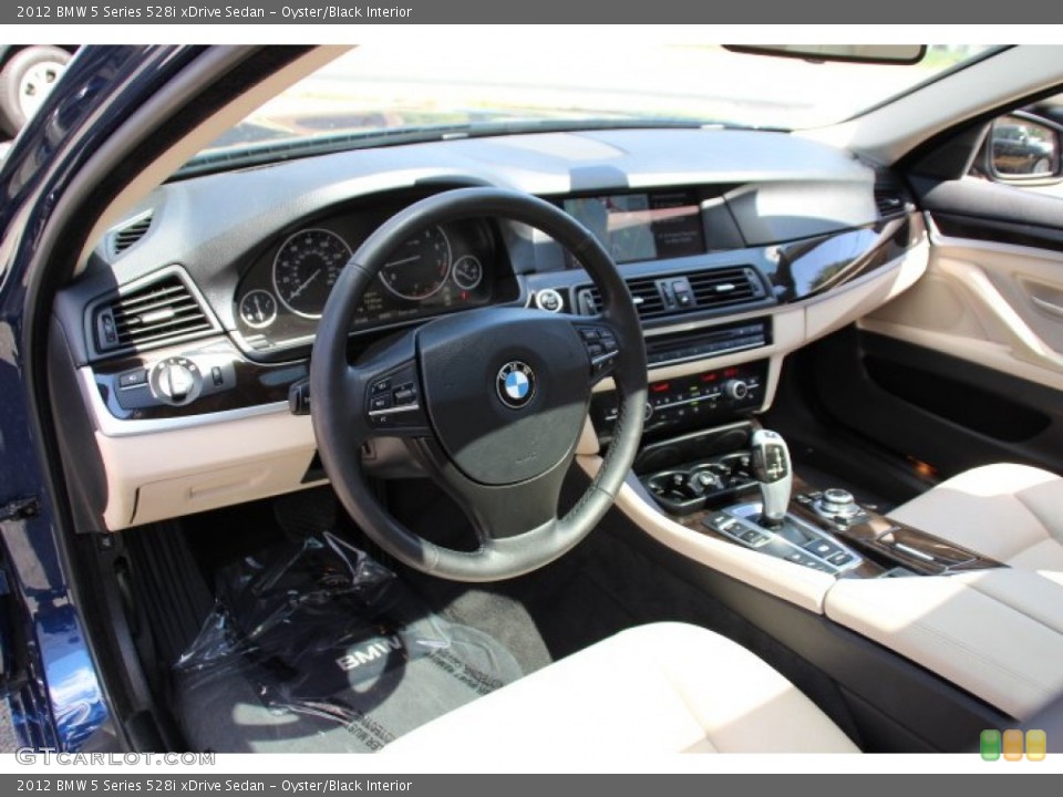 Oyster/Black Interior Photo for the 2012 BMW 5 Series 528i xDrive Sedan #96765183