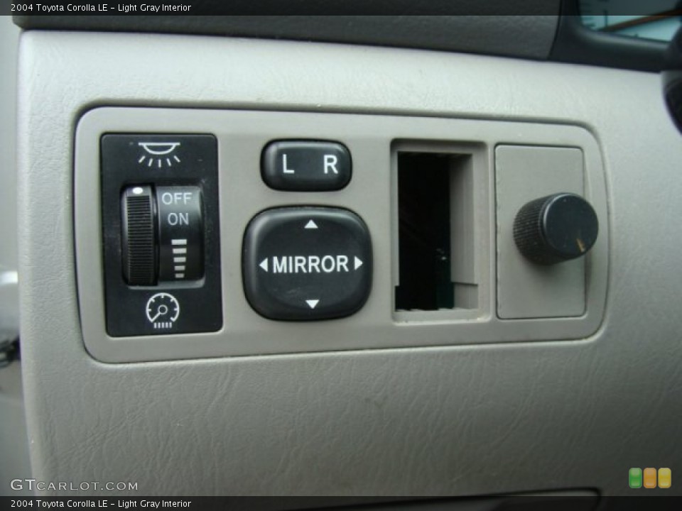 Light Gray Interior Controls for the 2004 Toyota Corolla LE #96919318