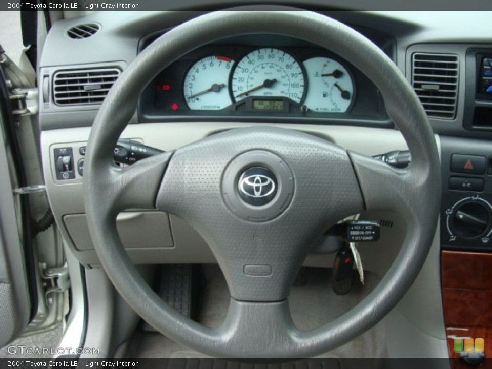 Light Gray Interior Steering Wheel for the 2004 Toyota Corolla LE #96919339