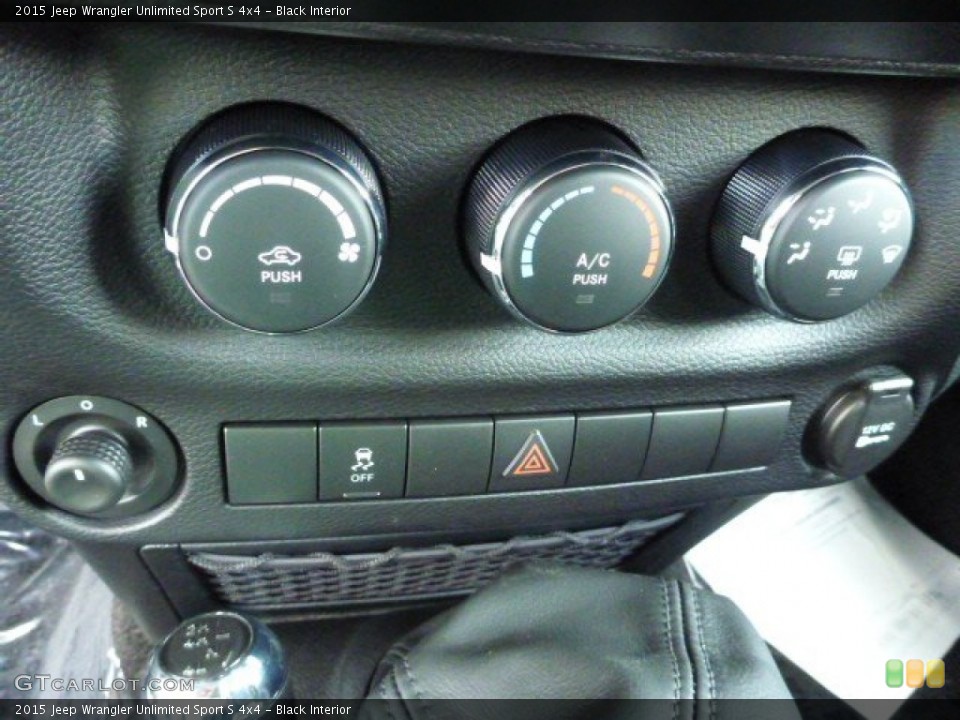 Black Interior Controls for the 2015 Jeep Wrangler Unlimited Sport S 4x4 #96974016