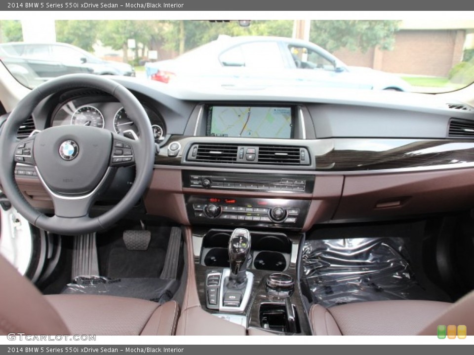 Mocha/Black Interior Dashboard for the 2014 BMW 5 Series 550i xDrive Sedan #97008935