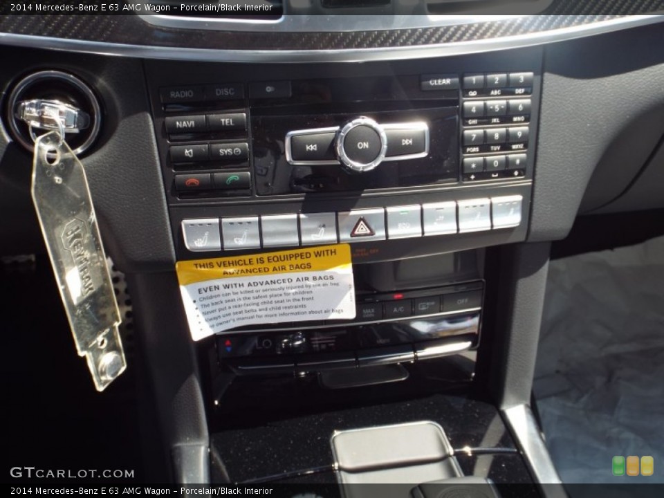 Porcelain/Black Interior Controls for the 2014 Mercedes-Benz E 63 AMG Wagon #97069975