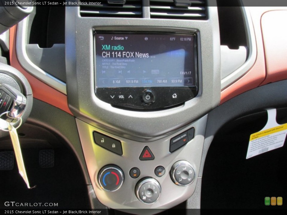 Jet Black/Brick Interior Controls for the 2015 Chevrolet Sonic LT Sedan #97121012