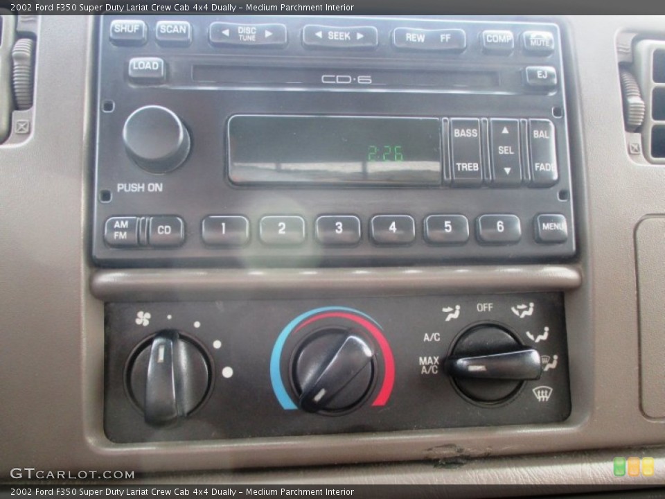 Medium Parchment Interior Controls for the 2002 Ford F350 Super Duty Lariat Crew Cab 4x4 Dually #97320568