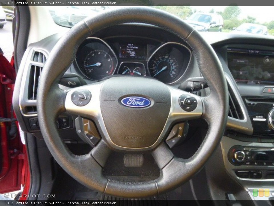 Charcoal Black Leather Interior Steering Wheel for the 2012 Ford Focus Titanium 5-Door #97347294