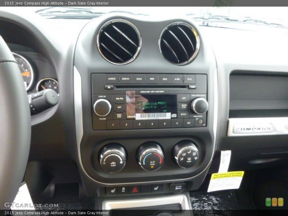 Dark Slate Gray Interior Controls for the 2015 Jeep Compass High Altitude #97349688