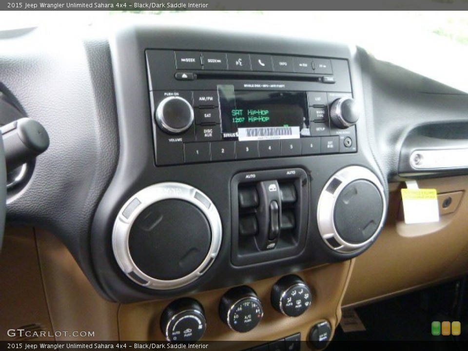 Black/Dark Saddle Interior Controls for the 2015 Jeep Wrangler Unlimited Sahara 4x4 #97352295