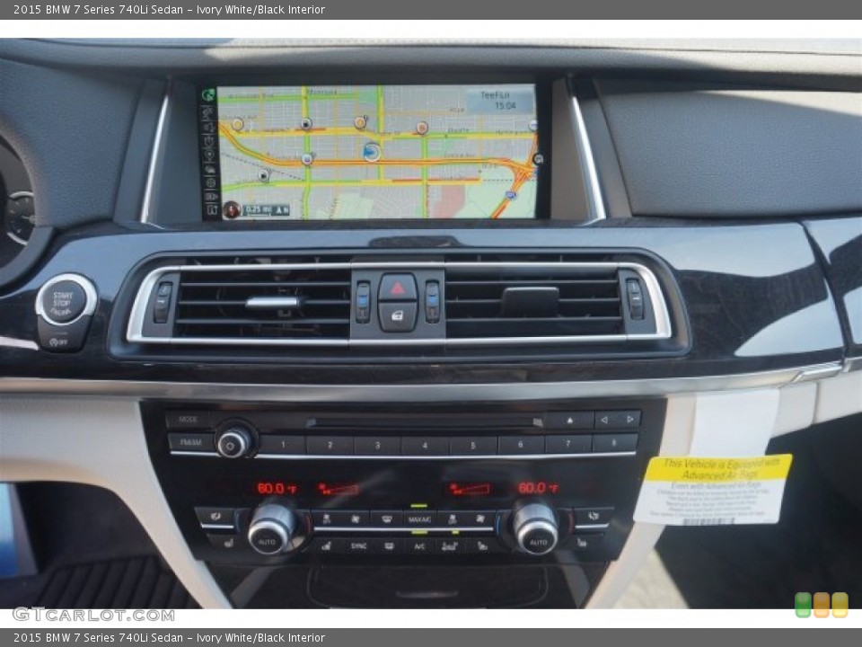 Ivory White/Black Interior Controls for the 2015 BMW 7 Series 740Li Sedan #97410941
