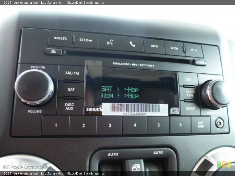 Black/Dark Saddle Interior Audio System for the 2015 Jeep Wrangler Unlimited Sahara 4x4 #97496058