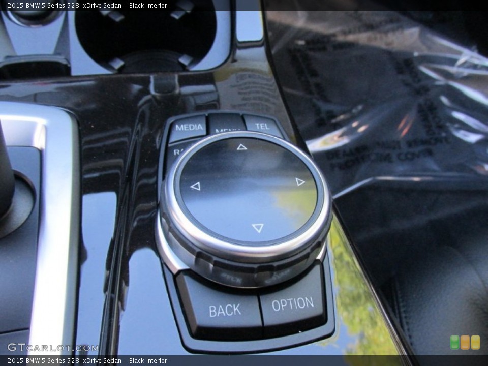 Black Interior Controls for the 2015 BMW 5 Series 528i xDrive Sedan #97530260