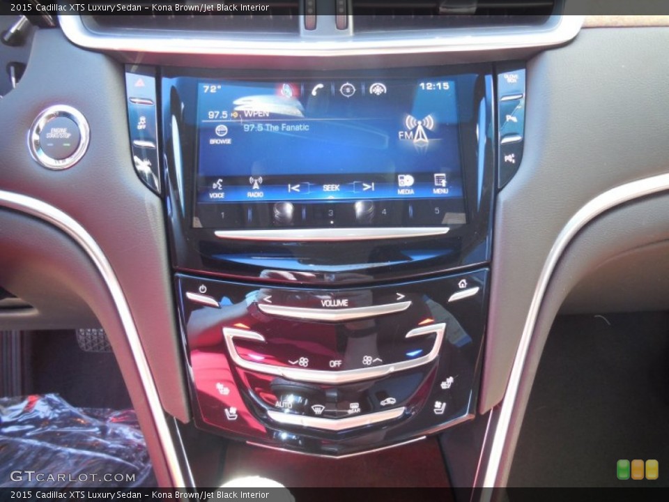 Kona Brown/Jet Black Interior Controls for the 2015 Cadillac XTS Luxury Sedan #97534598