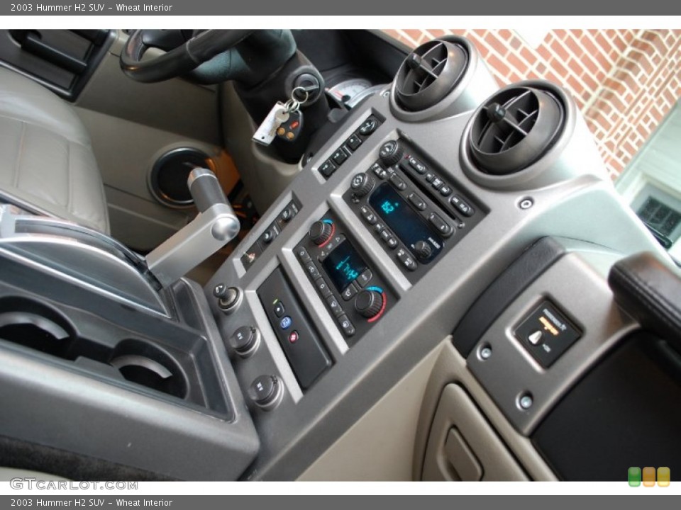 Wheat Interior Controls for the 2003 Hummer H2 SUV #97654881