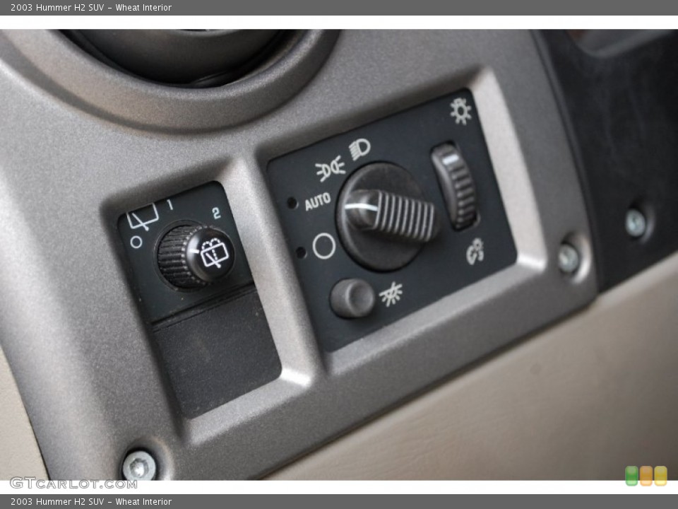 Wheat Interior Controls for the 2003 Hummer H2 SUV #97655847