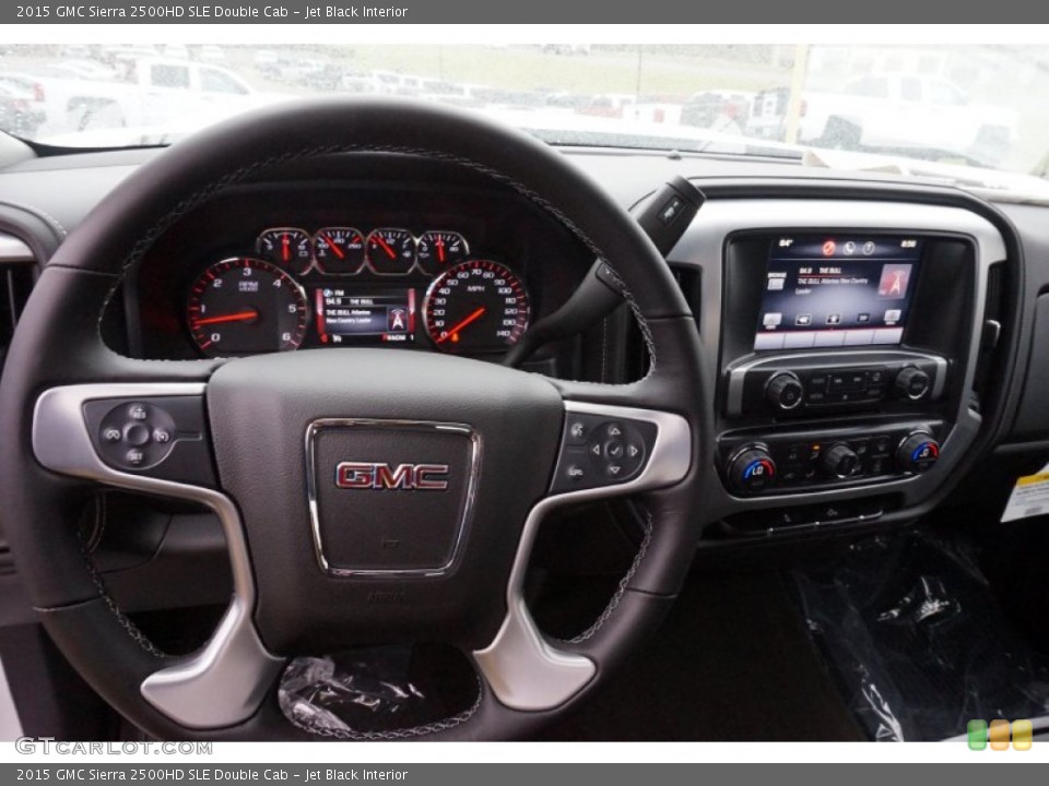 Jet Black Interior Steering Wheel for the 2015 GMC Sierra 2500HD SLE Double Cab #97658677