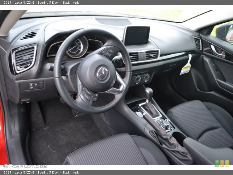 Black Interior Prime Interior for the 2015 Mazda MAZDA3 i Touring 5 Door #97703415