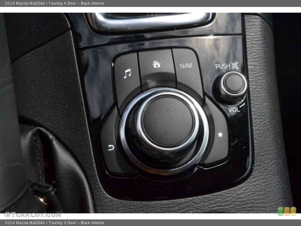 Black Interior Controls for the 2014 Mazda MAZDA3 i Touring 4 Door #97707717