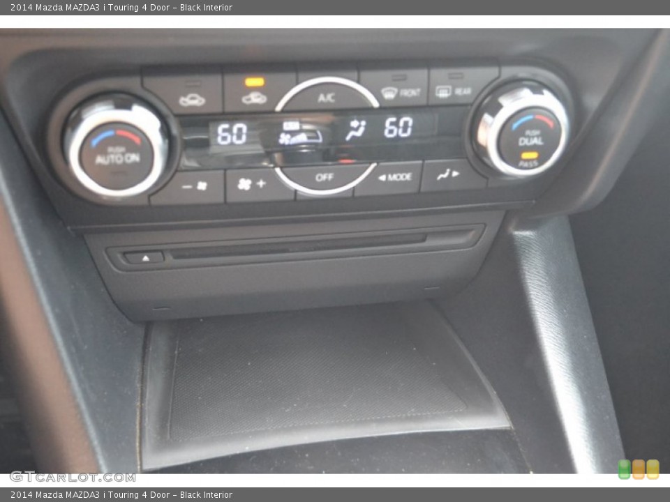 Black Interior Controls for the 2014 Mazda MAZDA3 i Touring 4 Door #97707762