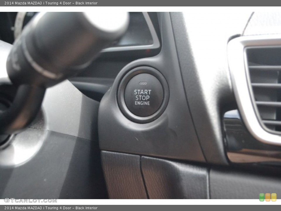 Black Interior Controls for the 2014 Mazda MAZDA3 i Touring 4 Door #97707861