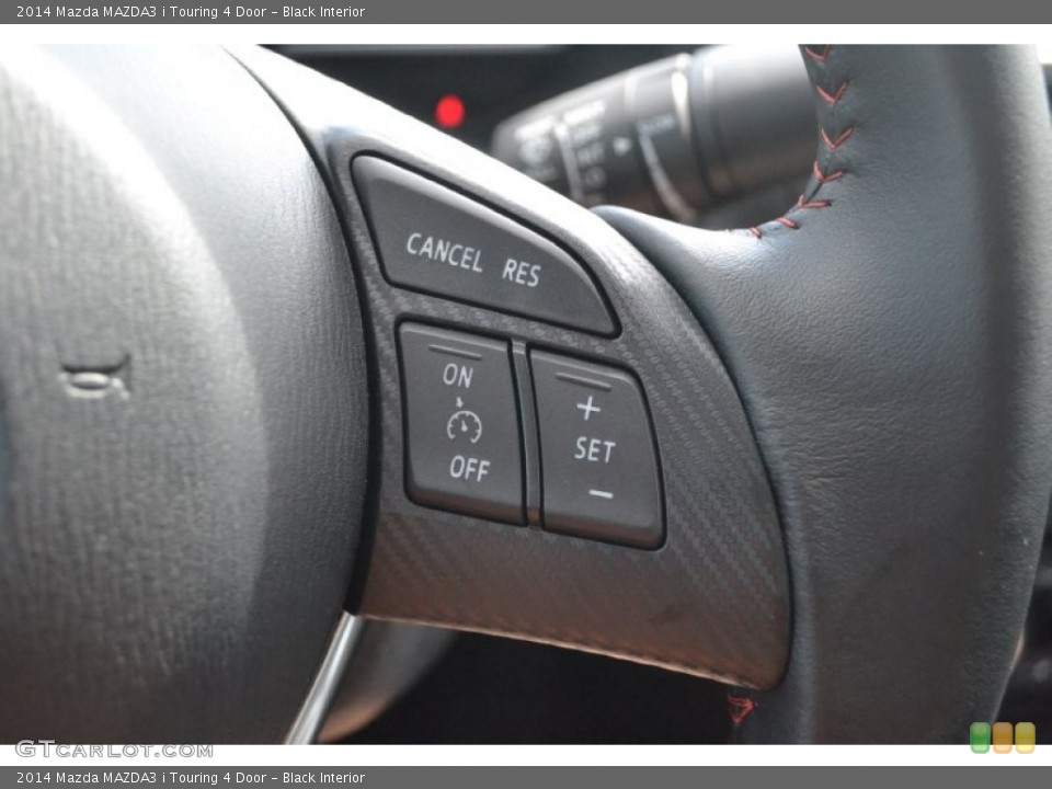 Black Interior Controls for the 2014 Mazda MAZDA3 i Touring 4 Door #97707879