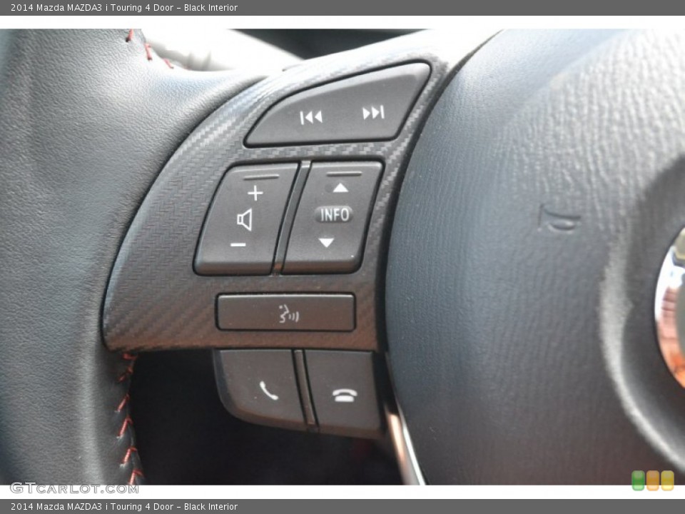 Black Interior Controls for the 2014 Mazda MAZDA3 i Touring 4 Door #97707900