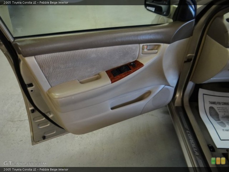 Pebble Beige Interior Door Panel for the 2005 Toyota Corolla LE #97936893