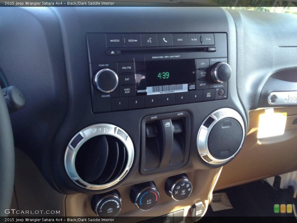 Black/Dark Saddle Interior Controls for the 2015 Jeep Wrangler Sahara 4x4 #97942409