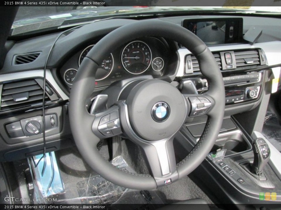 Black Interior Steering Wheel for the 2015 BMW 4 Series 435i xDrive Convertible #97980349