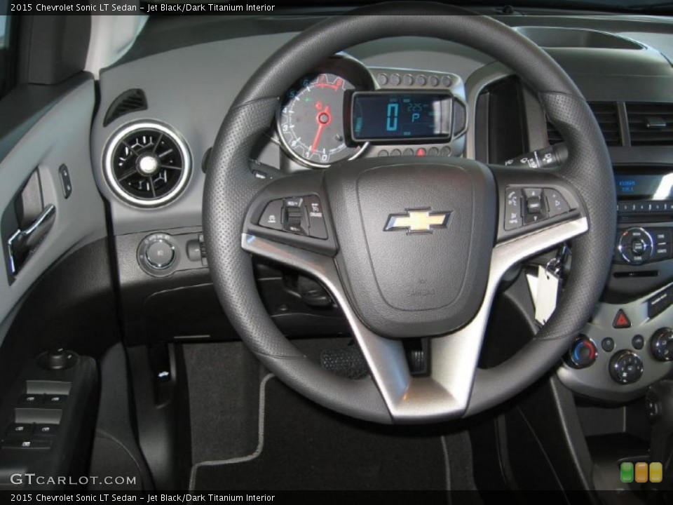 Jet Black/Dark Titanium Interior Steering Wheel for the 2015 Chevrolet Sonic LT Sedan #98023891