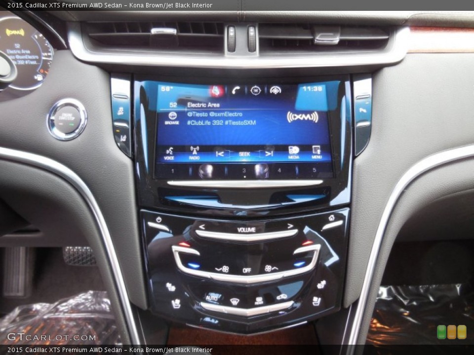 Kona Brown/Jet Black Interior Controls for the 2015 Cadillac XTS Premium AWD Sedan #98105666