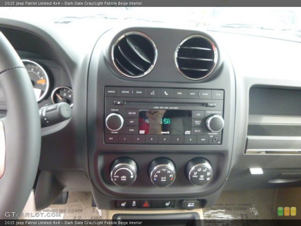 Dark Slate Gray/Light Pebble Beige Interior Controls for the 2015 Jeep Patriot Limited 4x4 #98187558