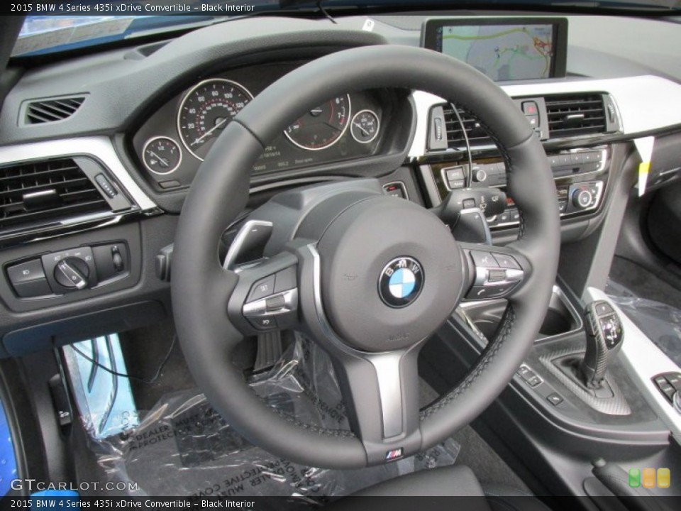 Black Interior Steering Wheel for the 2015 BMW 4 Series 435i xDrive Convertible #98256725