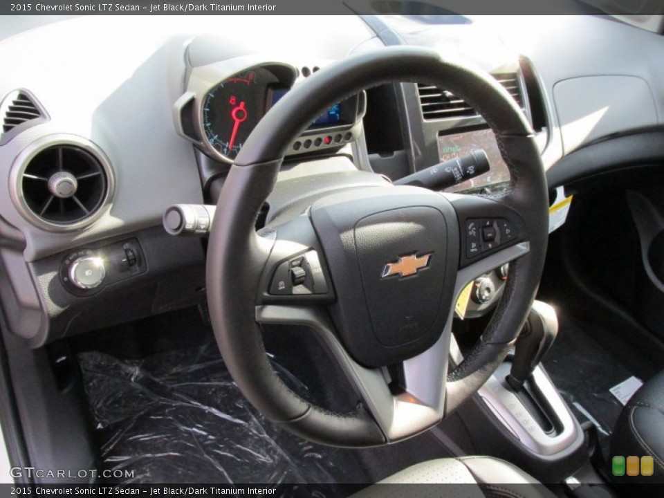 Jet Black/Dark Titanium Interior Steering Wheel for the 2015 Chevrolet Sonic LTZ Sedan #98314756
