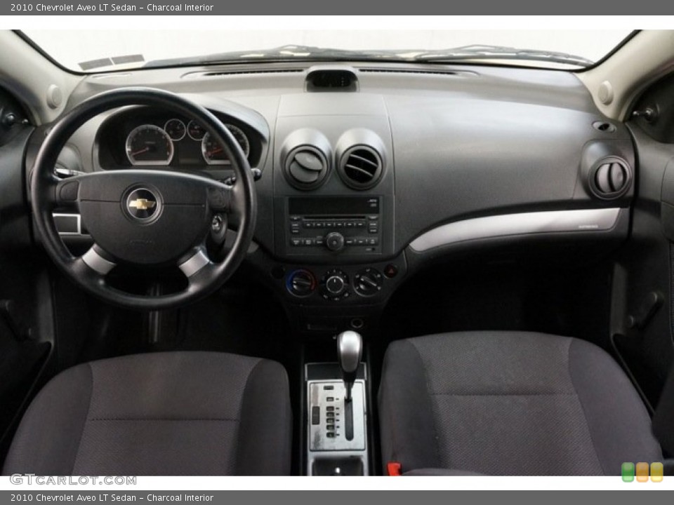 Charcoal Interior Dashboard for the 2010 Chevrolet Aveo LT Sedan #98349636