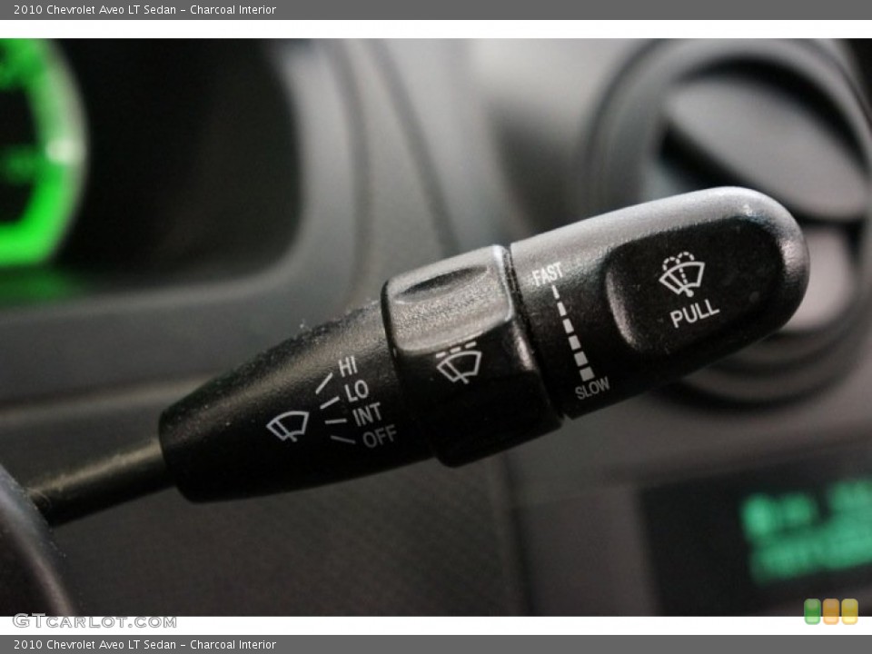 Charcoal Interior Controls for the 2010 Chevrolet Aveo LT Sedan #98349714