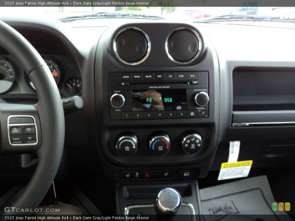 Dark Slate Gray/Light Pebble Beige Interior Controls for the 2015 Jeep Patriot High Altitude 4x4 #98362011