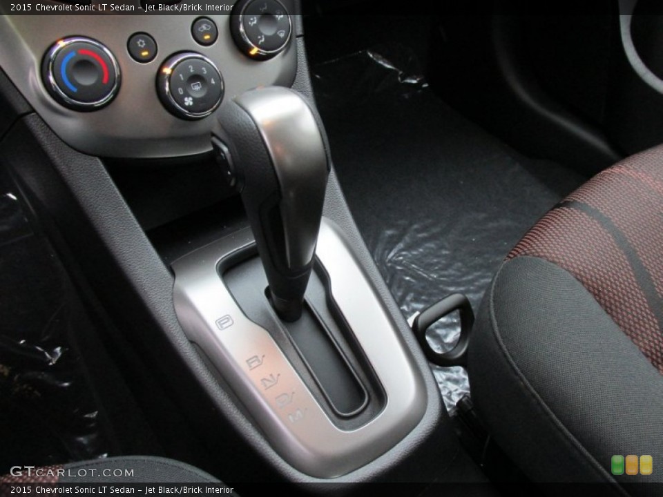 Jet Black/Brick Interior Transmission for the 2015 Chevrolet Sonic LT Sedan #98402440
