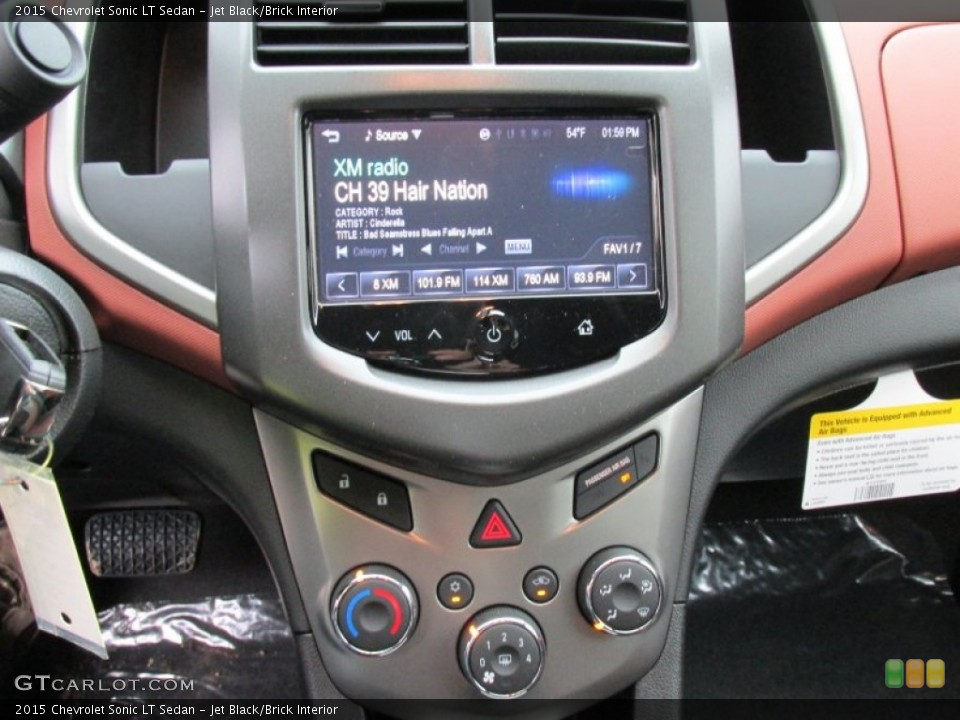 Jet Black/Brick Interior Controls for the 2015 Chevrolet Sonic LT Sedan #98402464