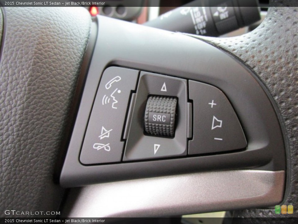 Jet Black/Brick Interior Controls for the 2015 Chevrolet Sonic LT Sedan #98402485