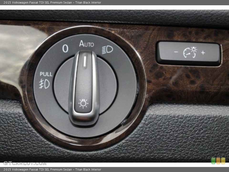 Titan Black Interior Controls for the 2015 Volkswagen Passat TDI SEL Premium Sedan #98483595