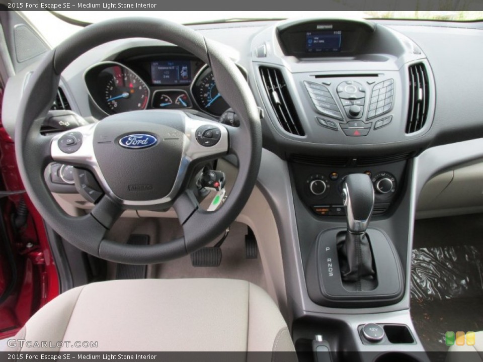 Medium Light Stone Interior Dashboard for the 2015 Ford Escape SE #98500365