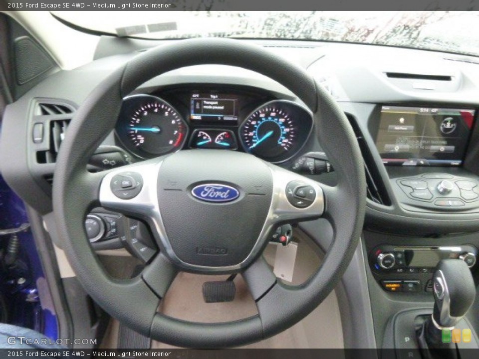 Medium Light Stone Interior Steering Wheel for the 2015 Ford Escape SE 4WD #98546724