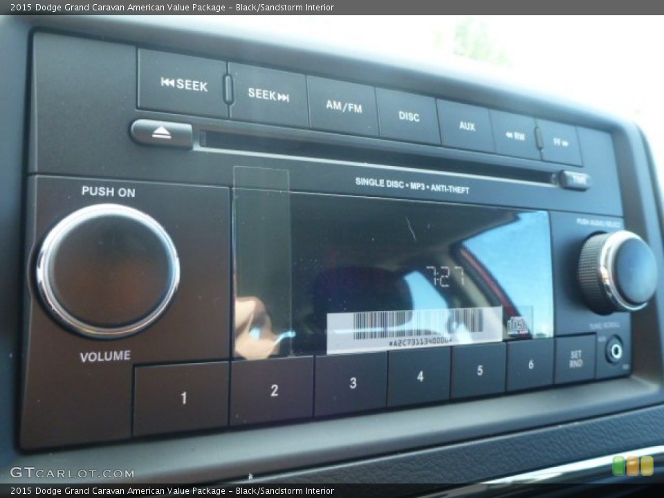 Black/Sandstorm Interior Audio System for the 2015 Dodge Grand Caravan American Value Package #98690020