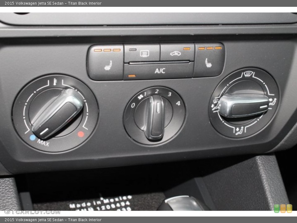 Titan Black Interior Controls for the 2015 Volkswagen Jetta SE Sedan #99032688