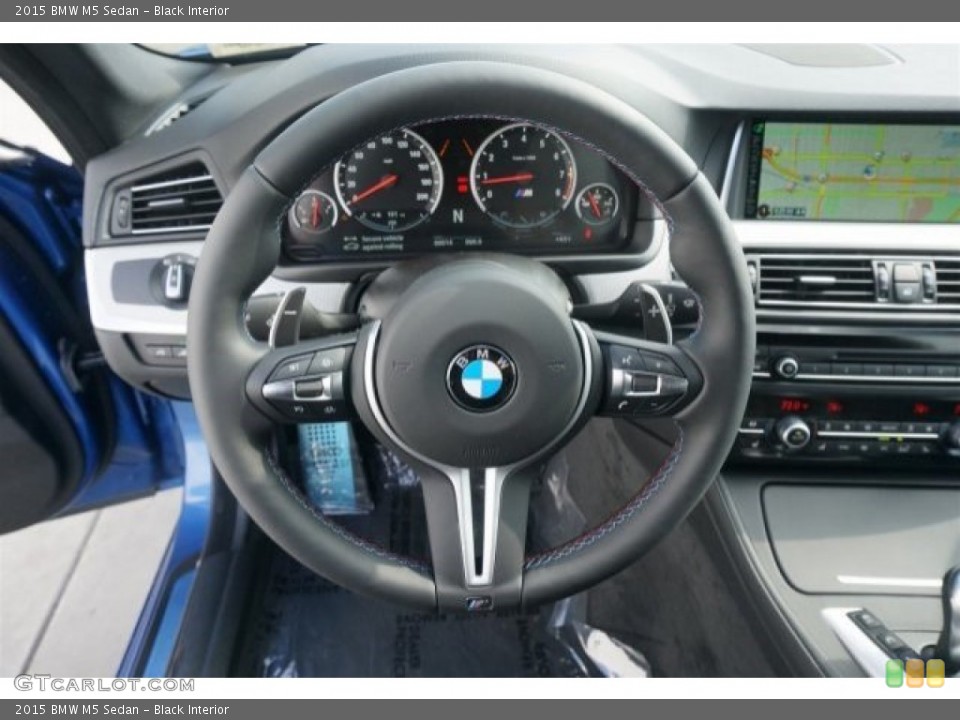 Black Interior Steering Wheel for the 2015 BMW M5 Sedan #99064344