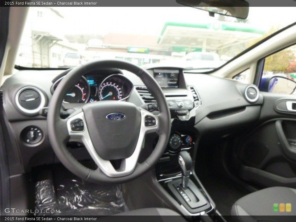 Charcoal Black Interior Dashboard for the 2015 Ford Fiesta SE Sedan #99145714
