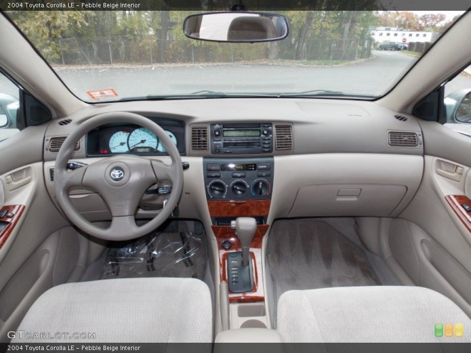 Pebble Beige Interior Dashboard for the 2004 Toyota Corolla LE #99164596