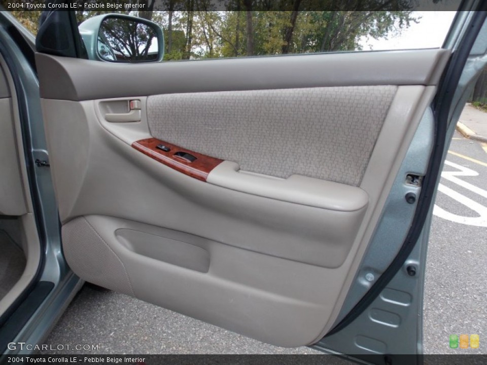 Pebble Beige Interior Door Panel for the 2004 Toyota Corolla LE #99164689